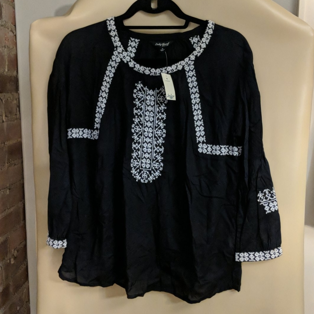 Lucky Brand black top with white embroidery.